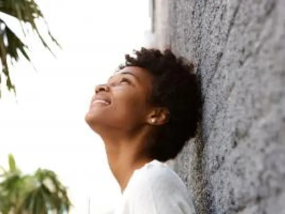 Student looking into the sky.